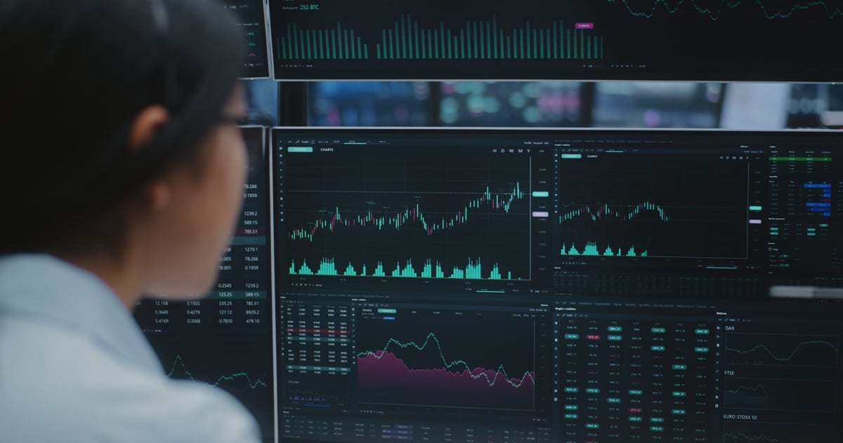Professional trading education with real-time stock data on multiple displays